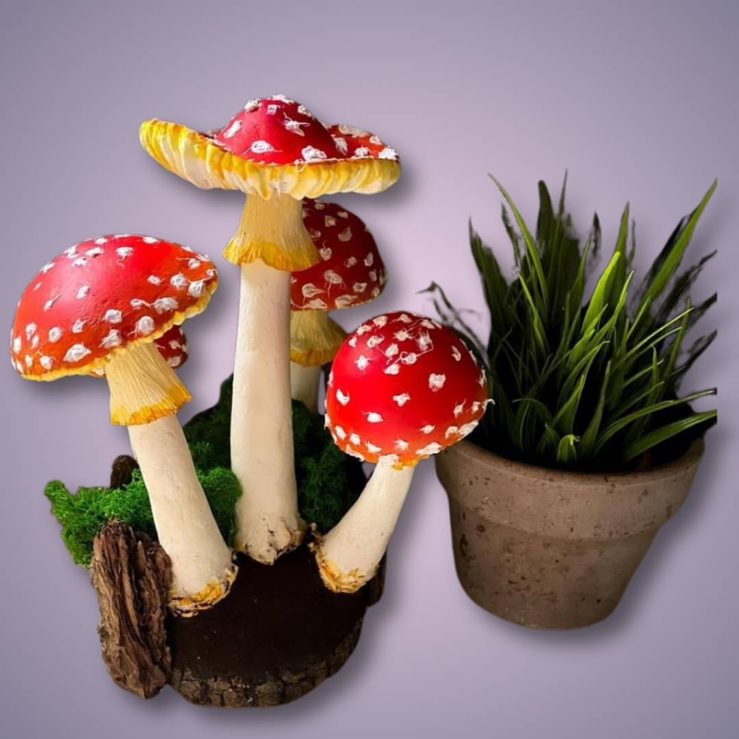 Decorative forest scene with papier-mâché amanita mushrooms – handmade arrangement with moss and plant on lilac background