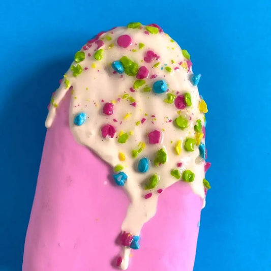 Close view of dripping effect on pink ice cream sculpture