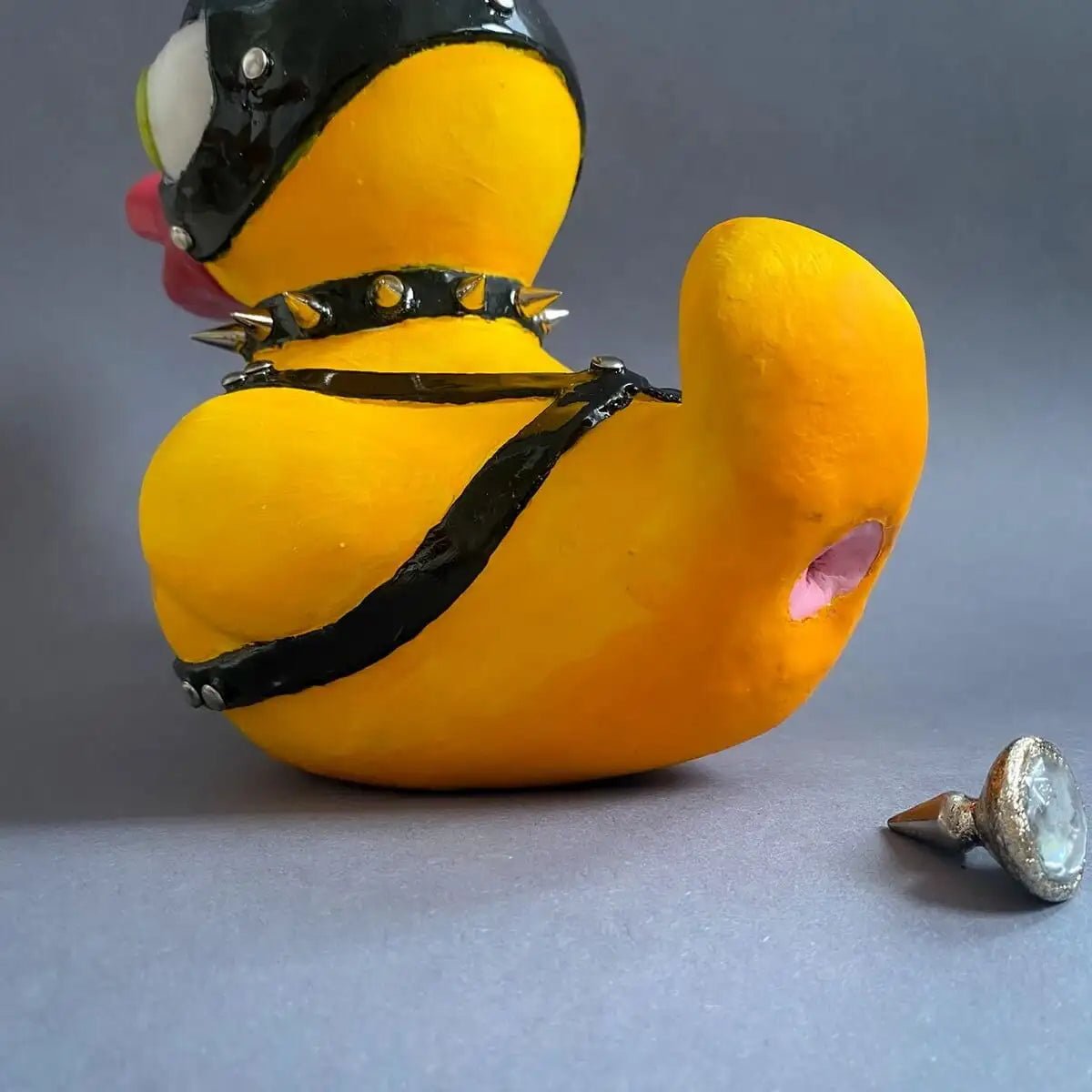 BDSM duck showing removable accessory plug – back view