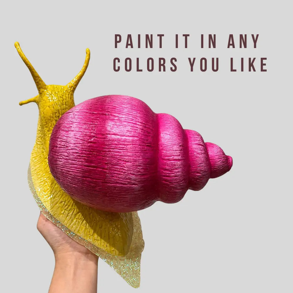 Colorful handmade papier-mâché snail sculpture with a pink shell and yellow body