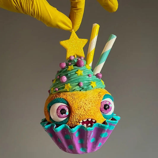Close-up of cupcake’s face with expressive moving eyes
