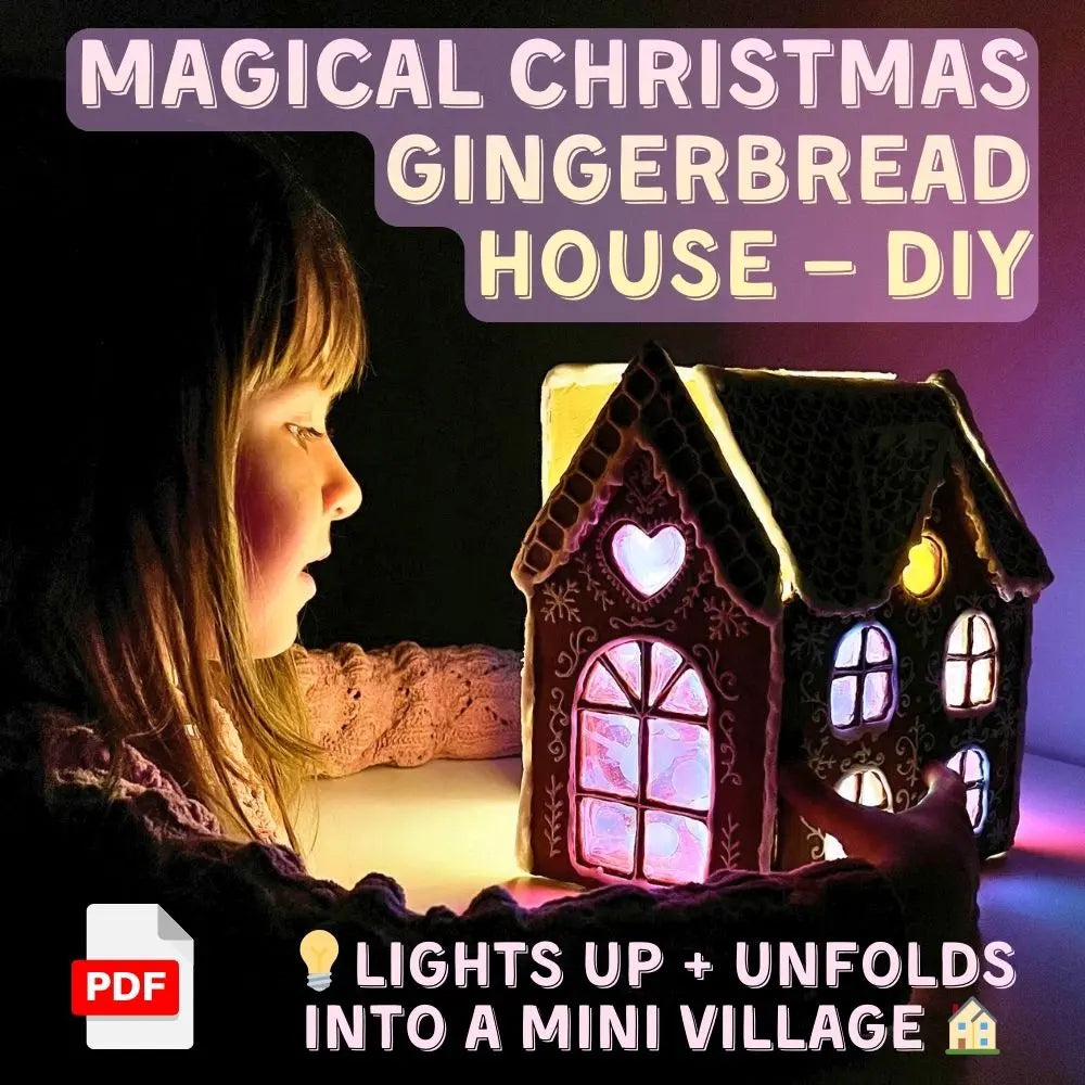 Girl looking at glowing gingerbread house that lights up and unfolds into a mini village, DIY papier-mâché craft