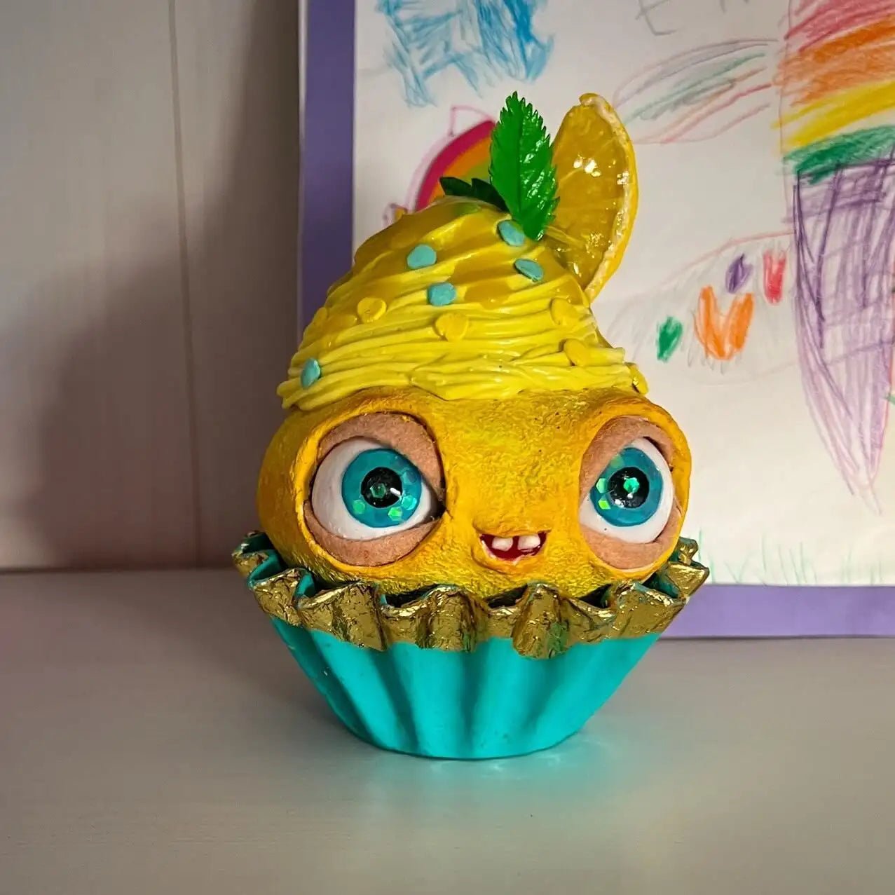 Lemon cupcake in kid’s room setting – handmade whimsical figurine