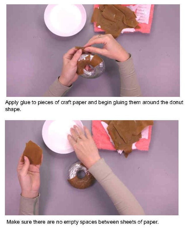Applying craft paper and glue to create a smooth base for a papier-mâché donut – step-by-step DIY tutorial