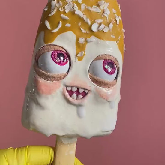 Video of caramel sundae papier-mâché figurine showing playful movement