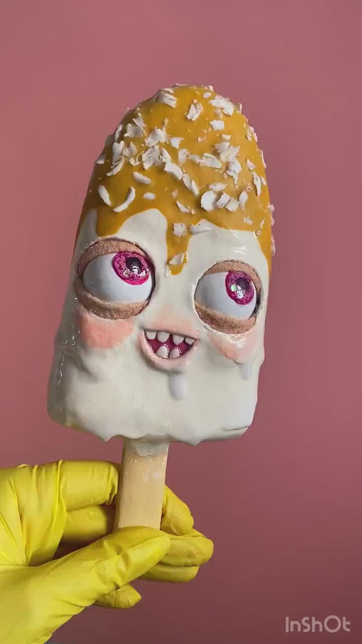 Video of caramel sundae papier-mâché figurine showing playful movement