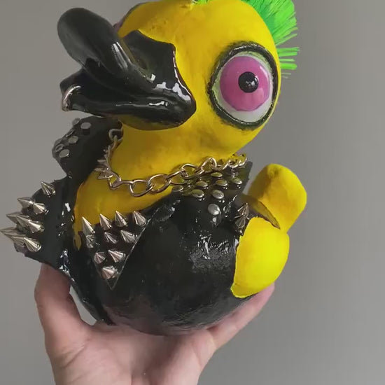 Video of punk duck sculpture showing movement and mohawk details