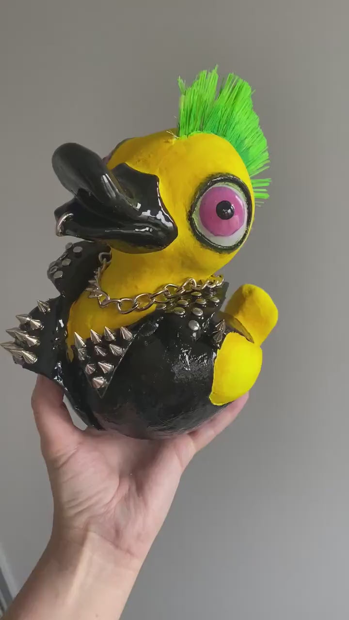 Video of punk duck sculpture showing movement and mohawk details